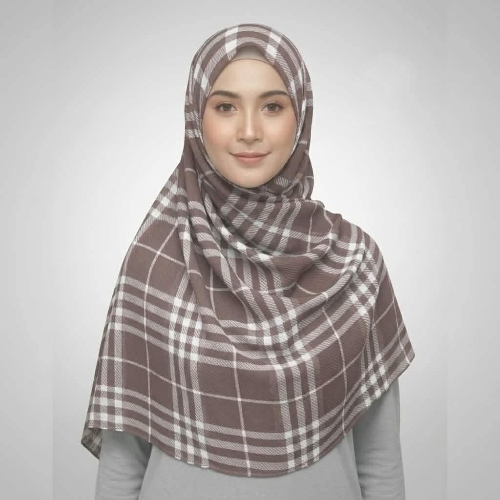 Woman wearing a brown and white checkered crepe printed hijab with plaid lines